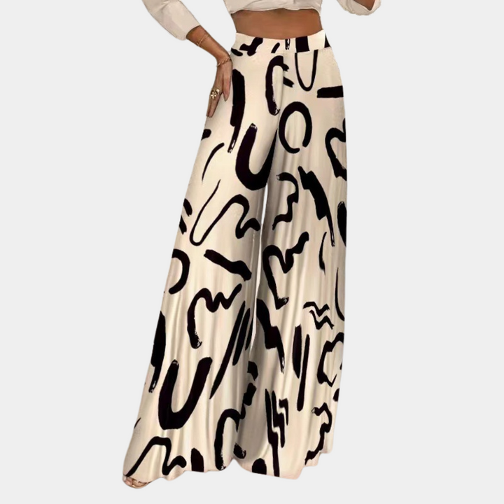 Élégant pantalon de femme en rubis avec un flux artistique et de larges tuyaux