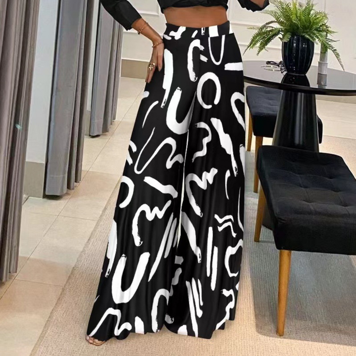 Élégant pantalon de femme en rubis avec un flux artistique et de larges tuyaux