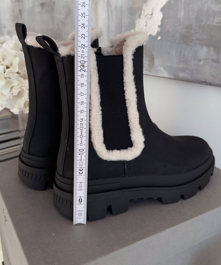 Bottes noires élégantes de Prima