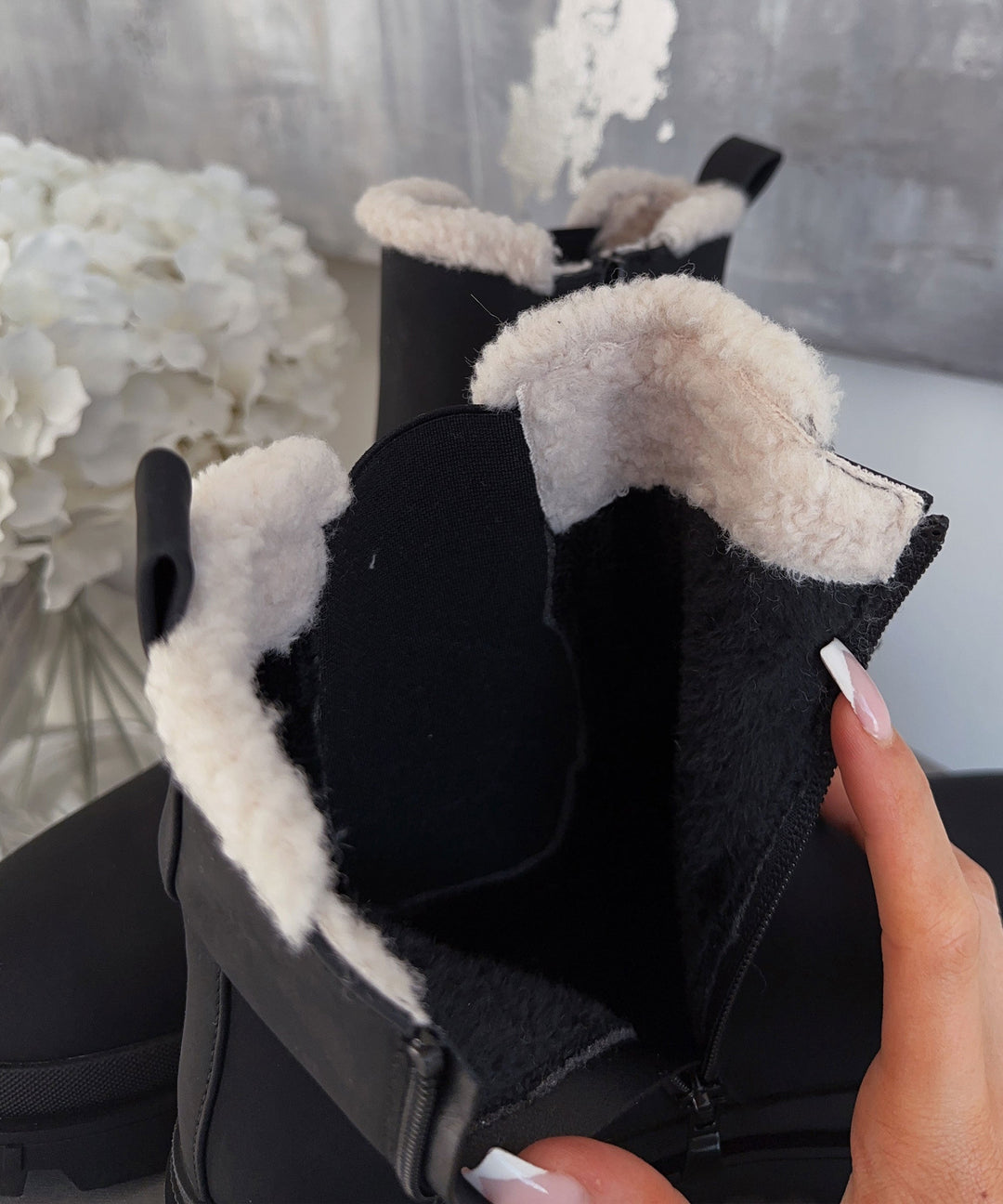 Bottes noires élégantes de Prima