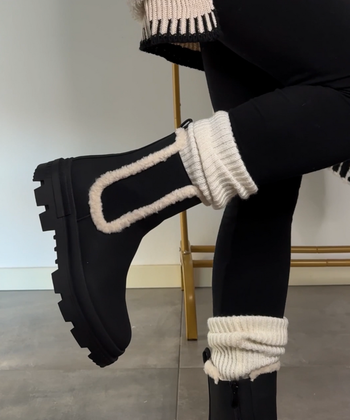 Bottes noires élégantes de Prima