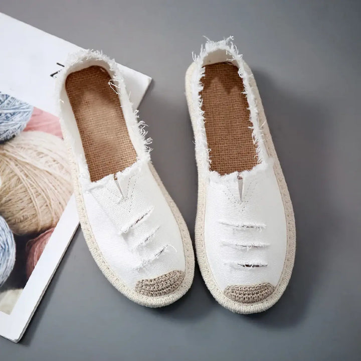 Laurynn | Élégantes espadrilles noires et blanches en toile usée très tendance